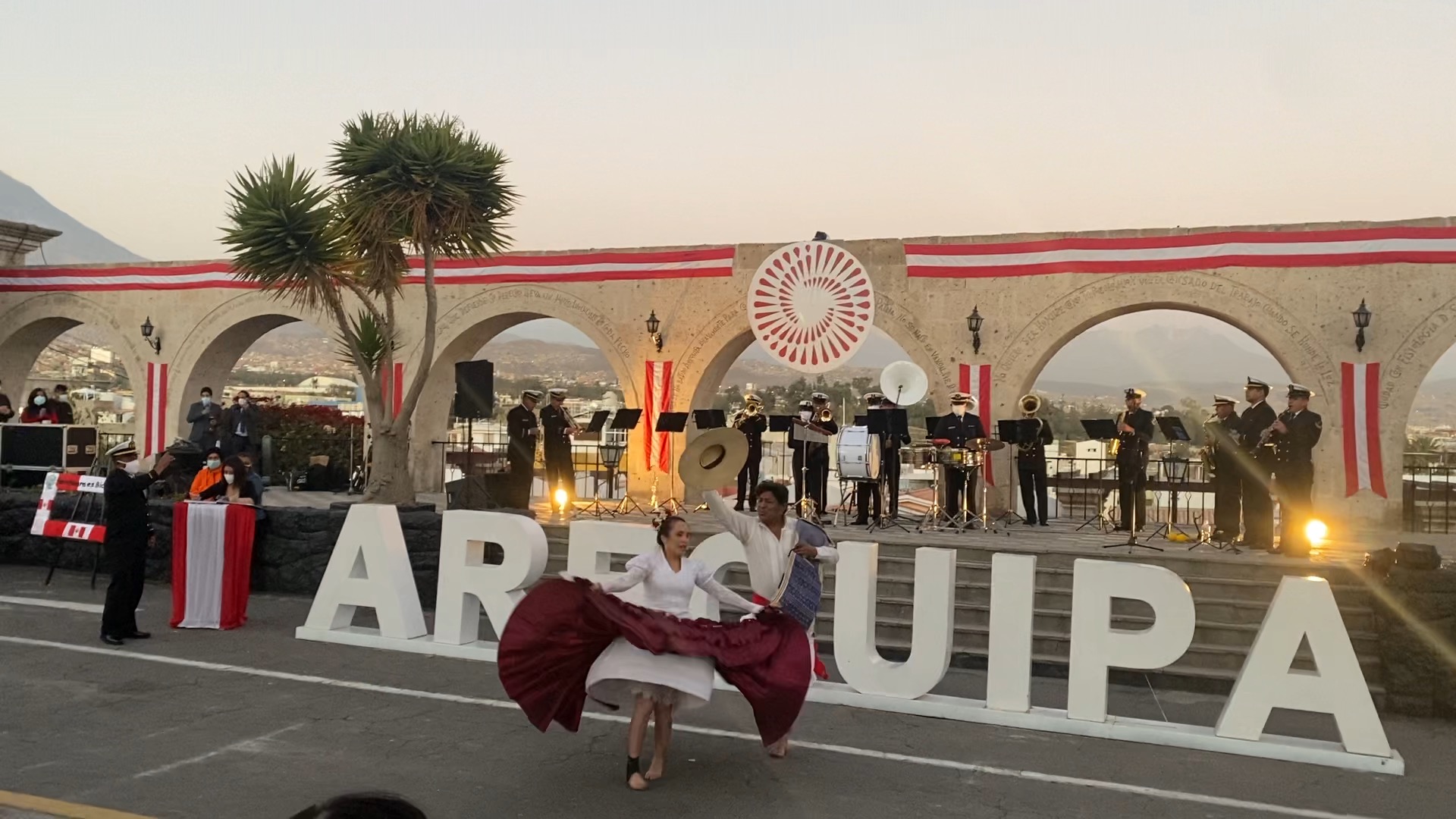 Dancers and a live band under the arches at Plaza de Yanahuara, Arequipa