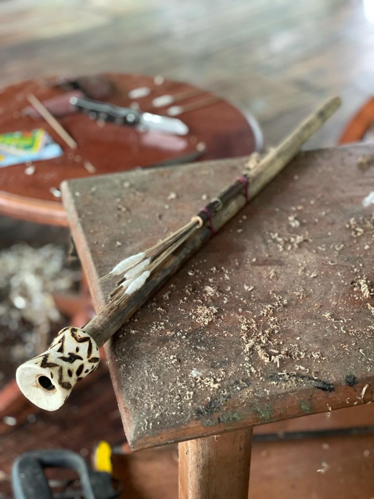 A handmade poison dart gun at the Treehouse Lodge
