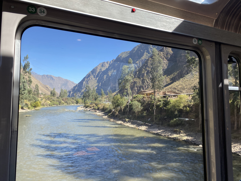 The Urubamba River valley through the window of the train to Machu Picchu
