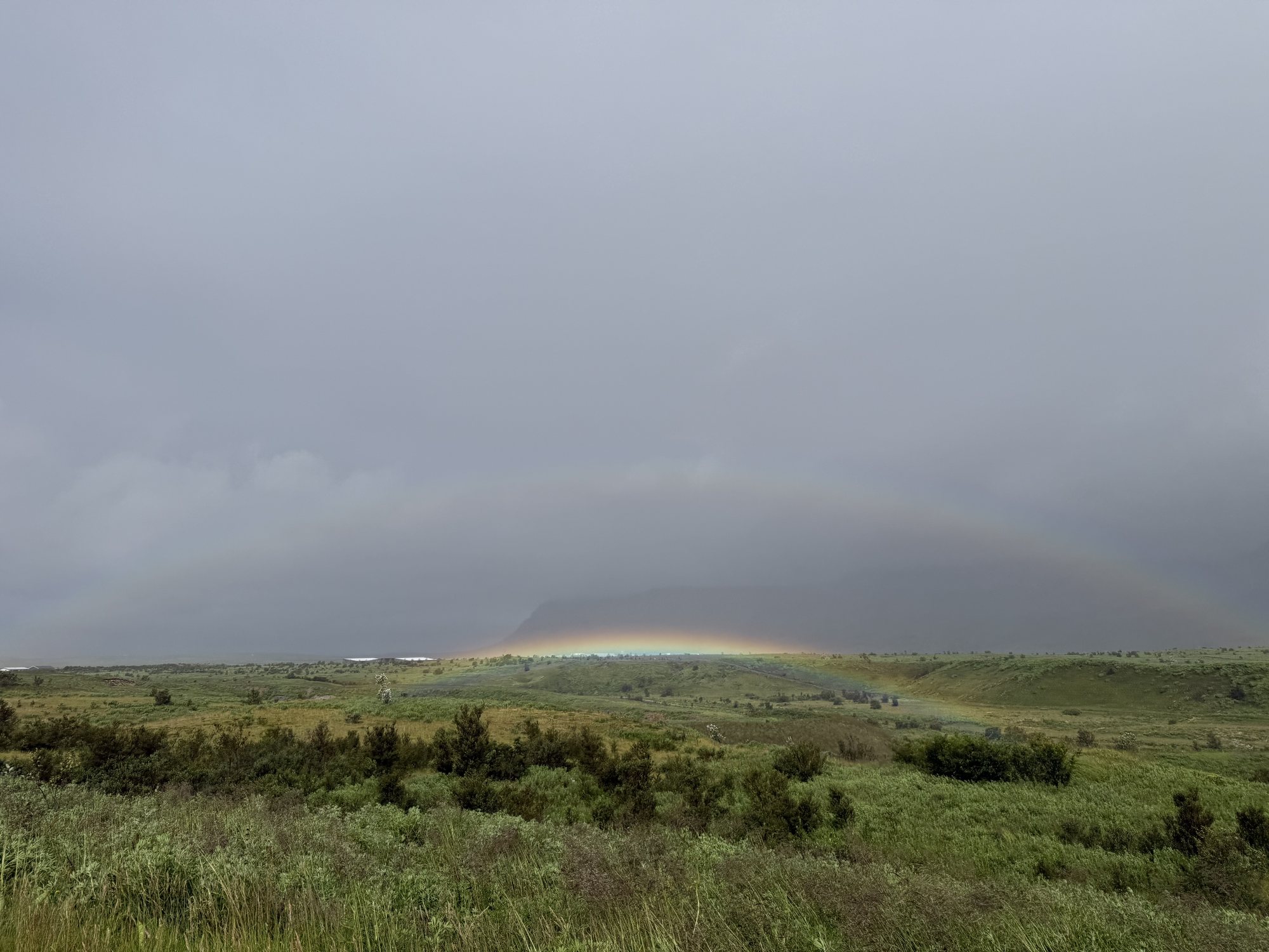 A double rainbow over the Icelandic countryside